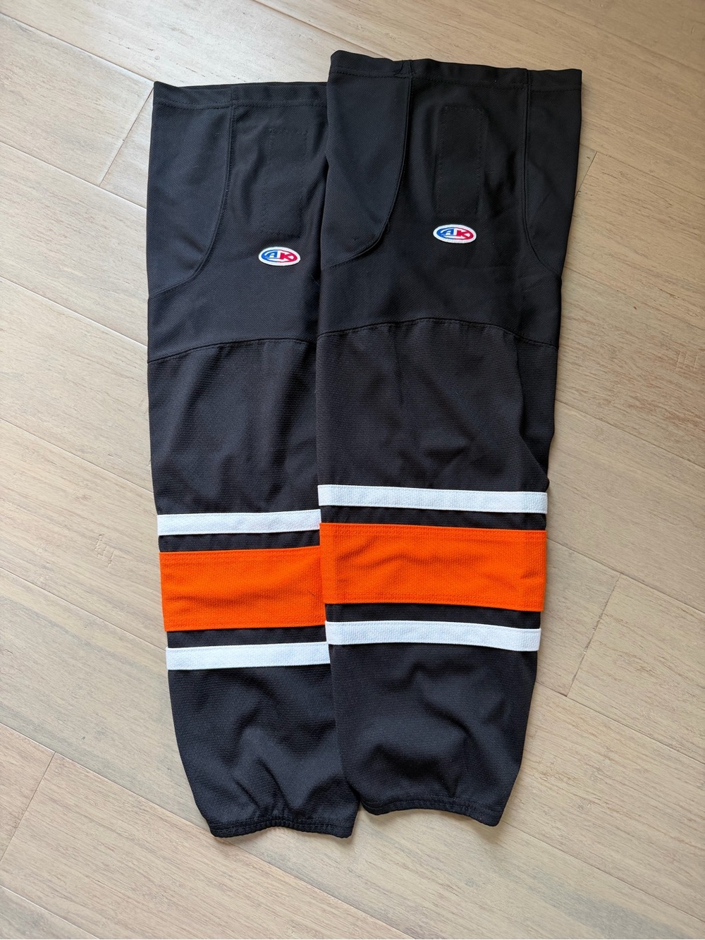 Unbranded Men's Black Hockey Sock Sleeves with Orange & White Stripes